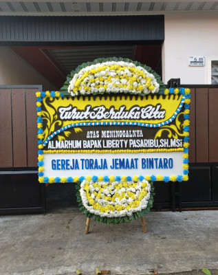 Papan Bunga Duka di Wareng